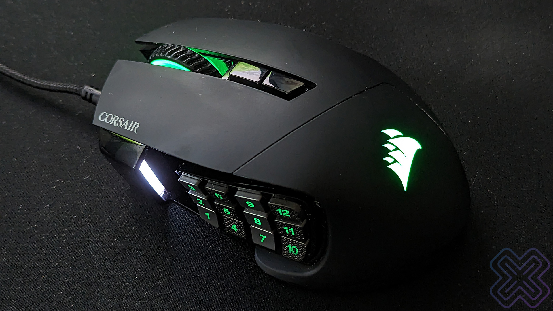 The Corsair Scimitar RGB Elite is my recommendation for an MMO gaming mouse
